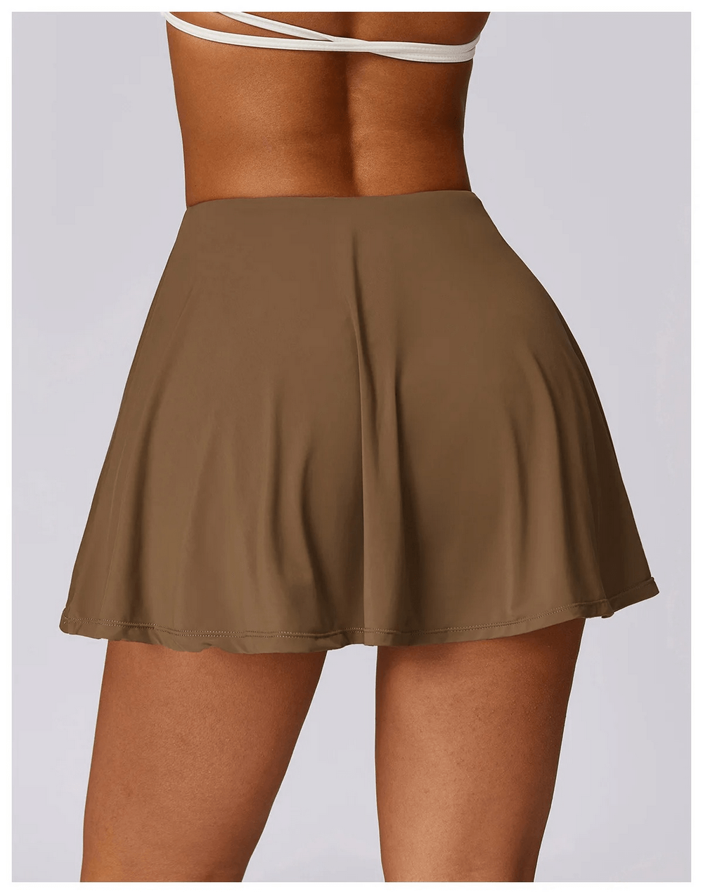 Back view of Stylish Women's Flared Sports Skirt SF2197 in brown, perfect for sports, dance, and active wear in various sizes.